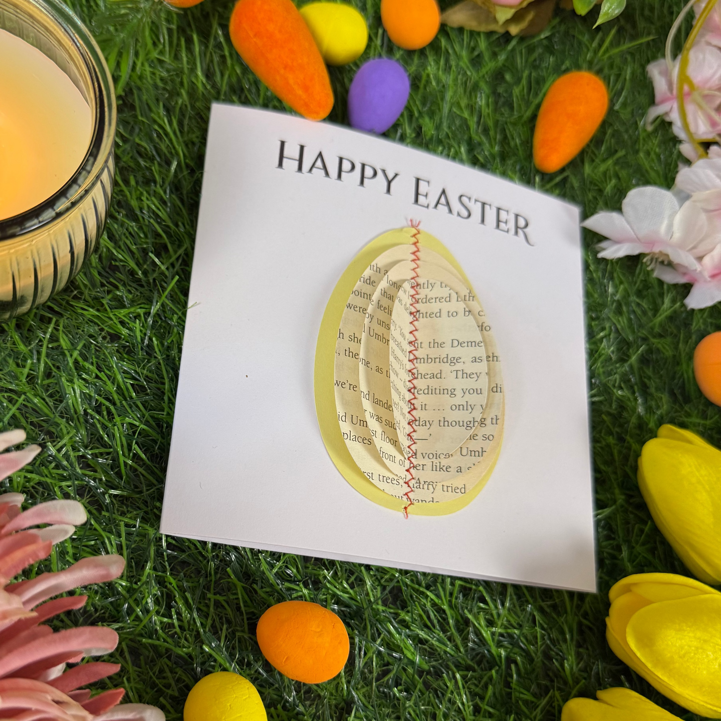 Unique Easter card with 3D egg made from book pages surrounded by spring flowers