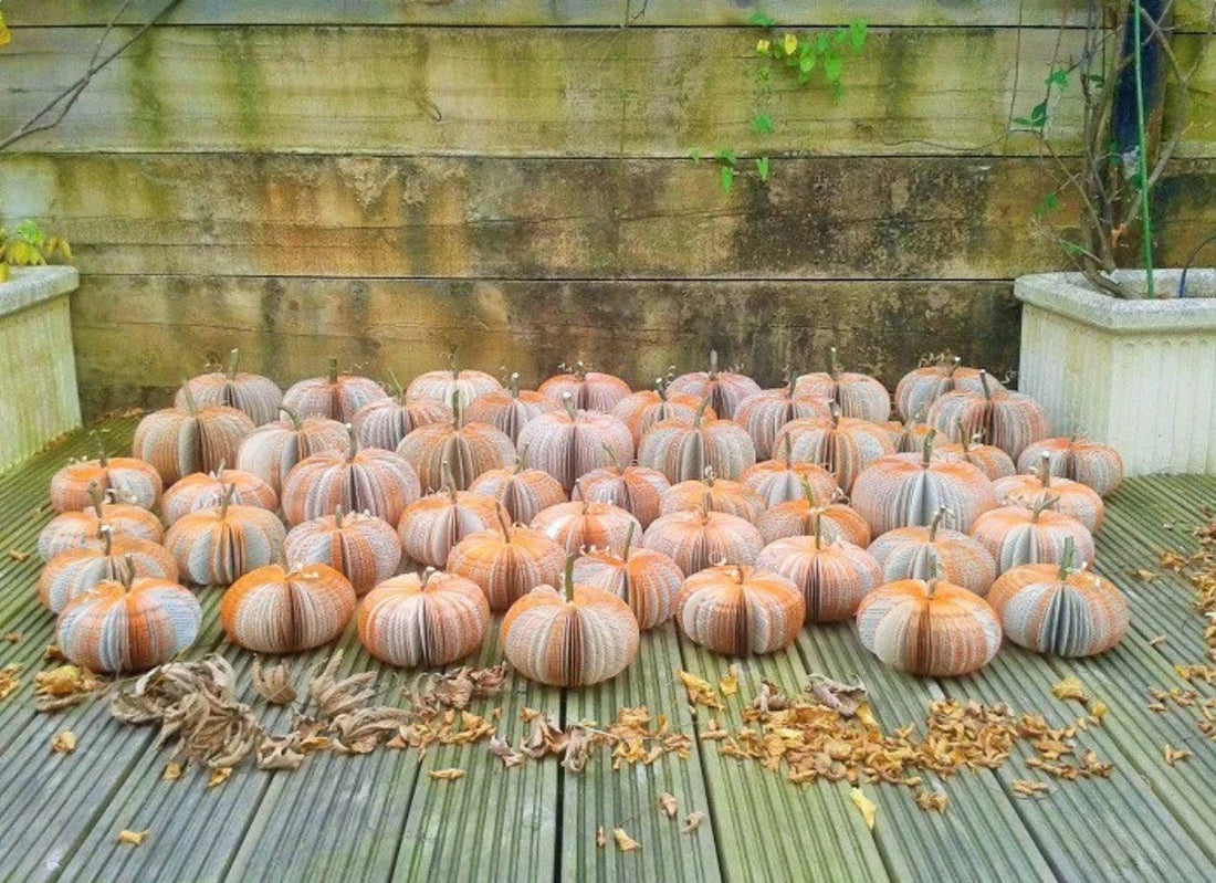 Set of 3 handmade book-page pumpkins made for Mamas & Papas Halloween window display