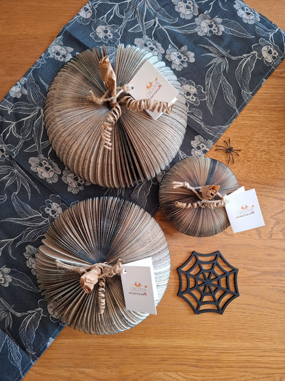 Set of 3 black handmade book pumpkin on white background