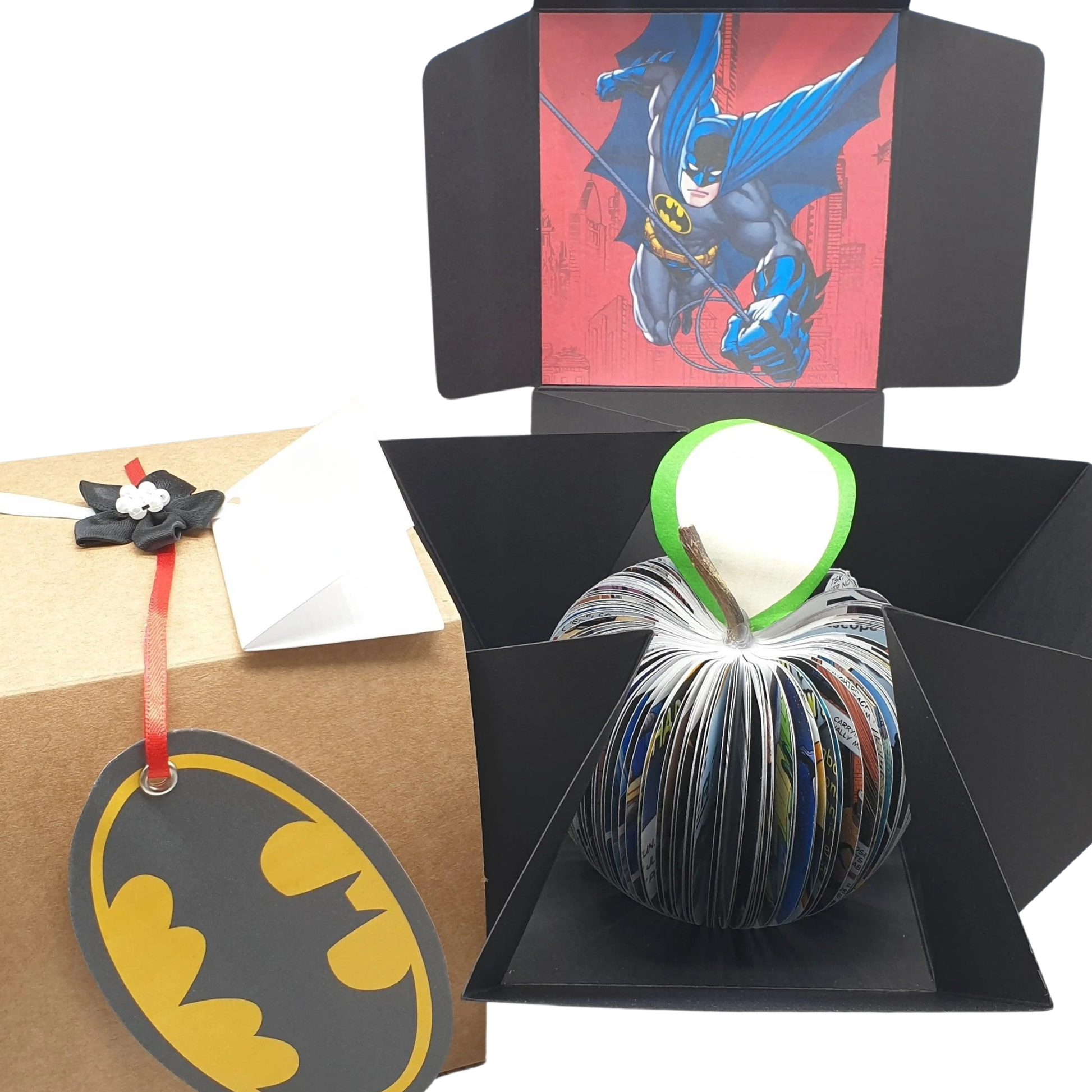 Batman comic book apple displayed beside original comic