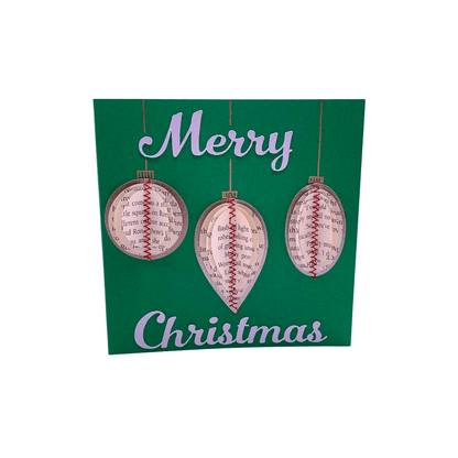 Close-up of Handmade Christmas Card showing hand-cut book pages