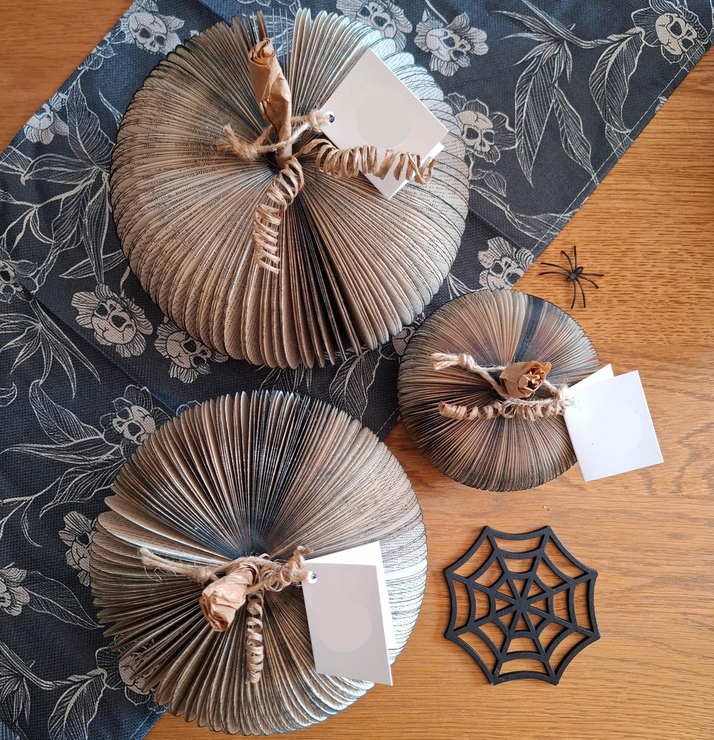 Set of 3 black handmade book pumpkin on gothic background