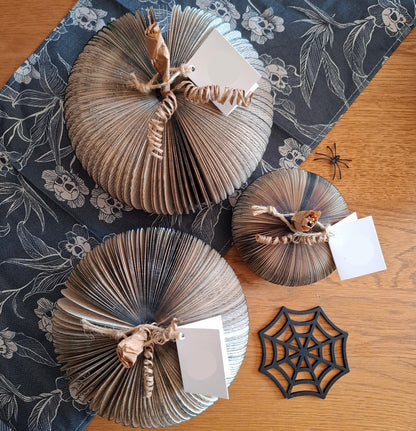 Set of 3 black handmade book pumpkin on gothic background