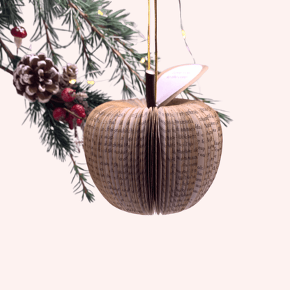 Hanging gold glitter apple book apple held in hands to show size, handmade paper anniversary gift