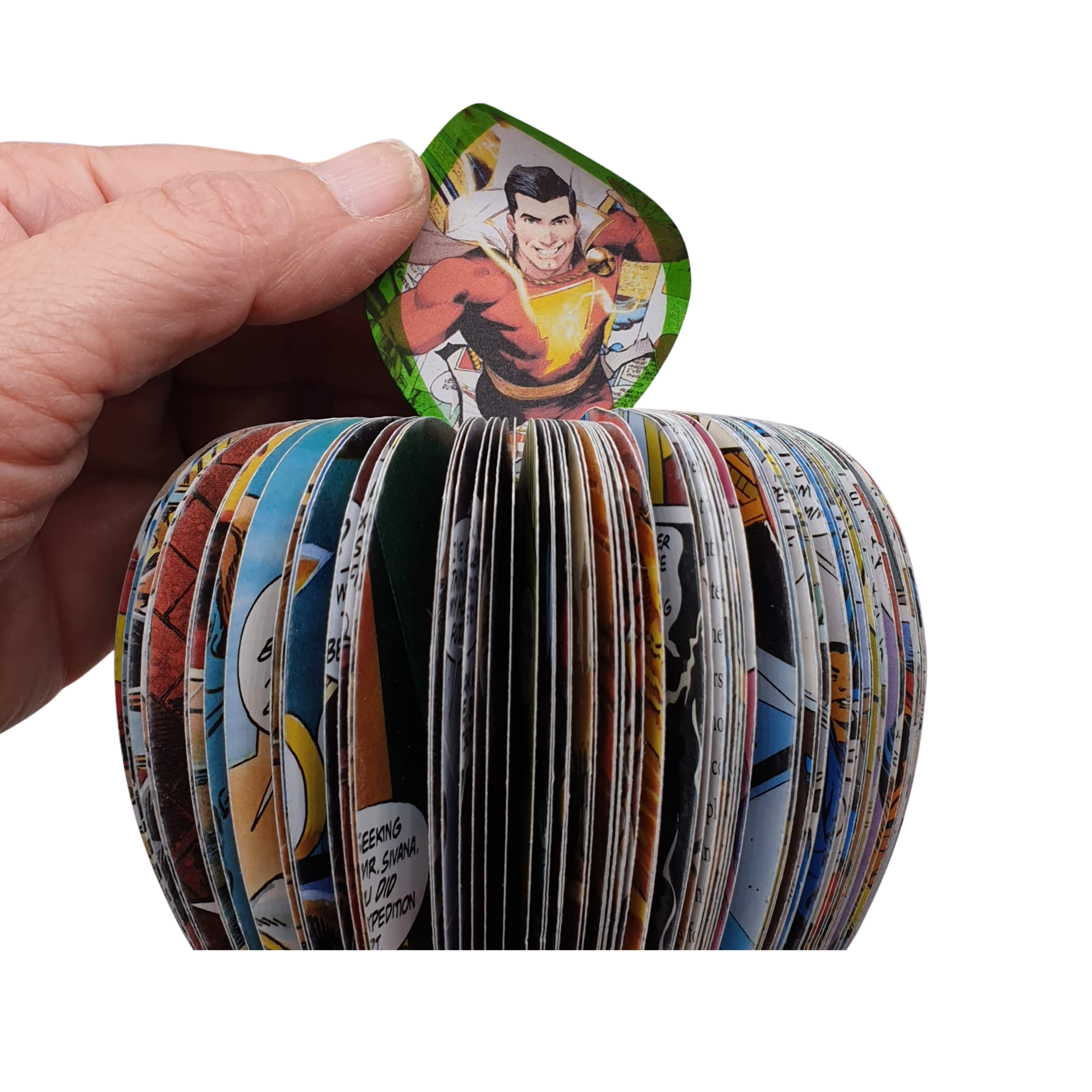 Shazam comic book apple displayed beside original comic