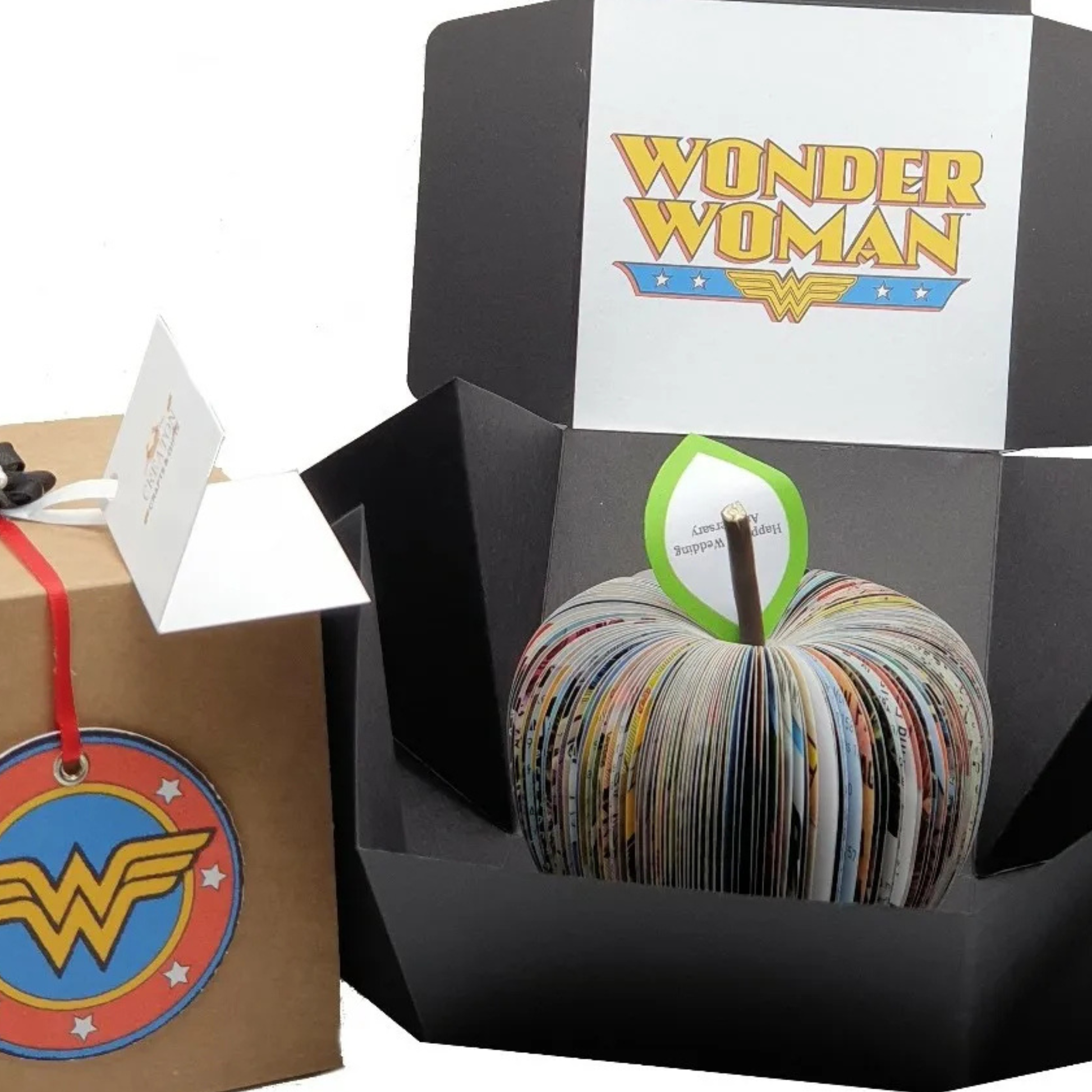 Wonder Woman comic book apple displayed beside original comic