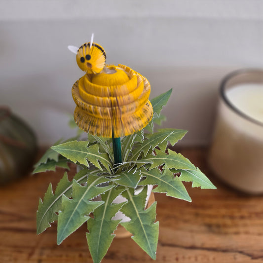 Dandelion and Bee Pot, handmade dandelion flower hand-cut from real book pages with a tiny book-page bee, in a white ceramic pot