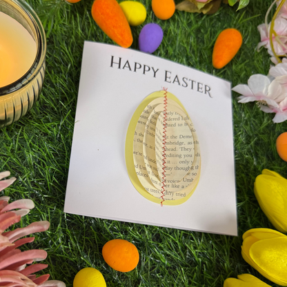Unique Easter card with 3D egg made from book pages surrounded by spring flowers