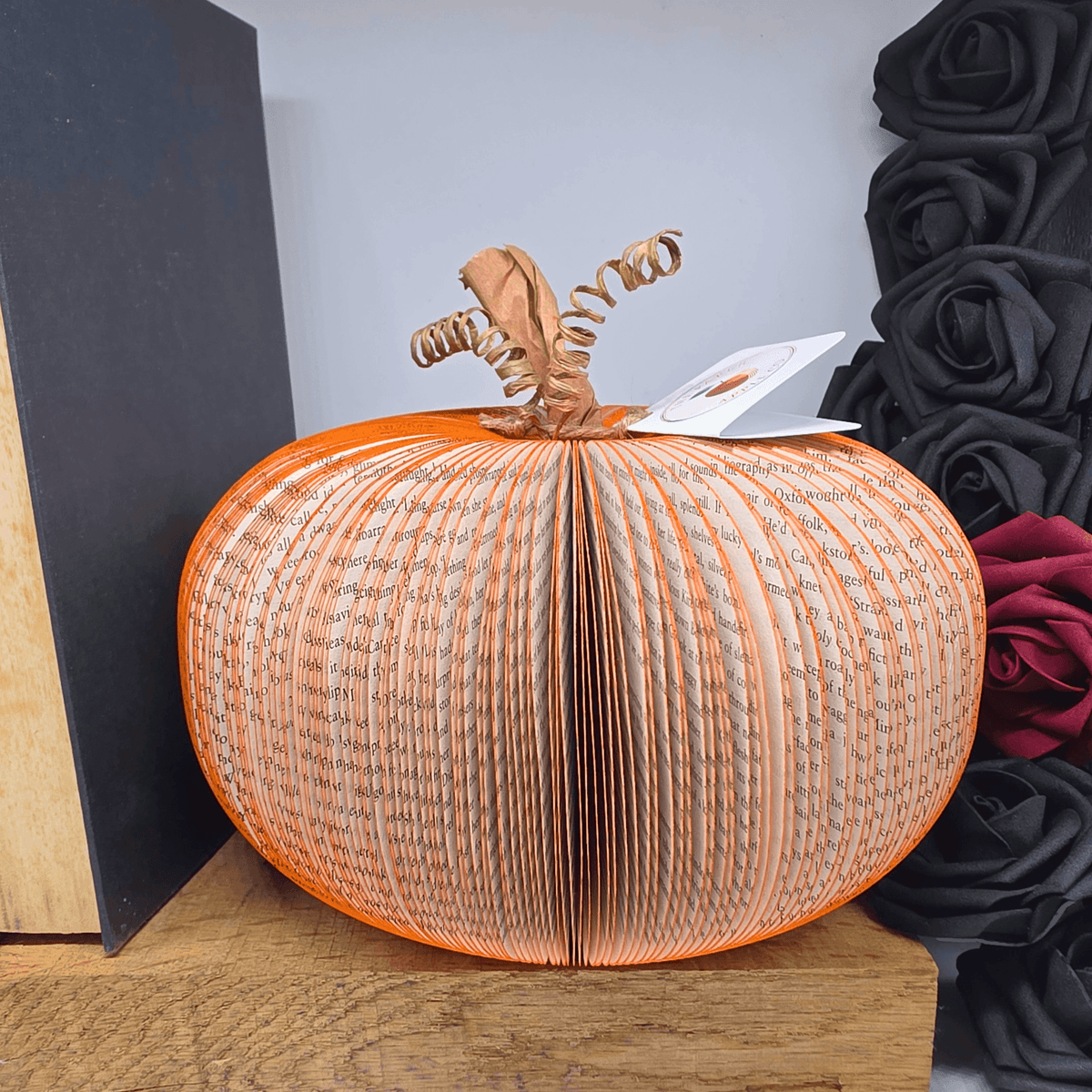Large handmade book pumpkin Halloween decoration with The Paper Apple Co gift tag