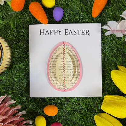 Literary Easter greeting card featuring a stitched egg made from recycled book pages