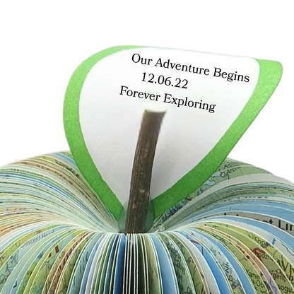 Close up of personalised leaf on handmade map apple showing custom anniversary message