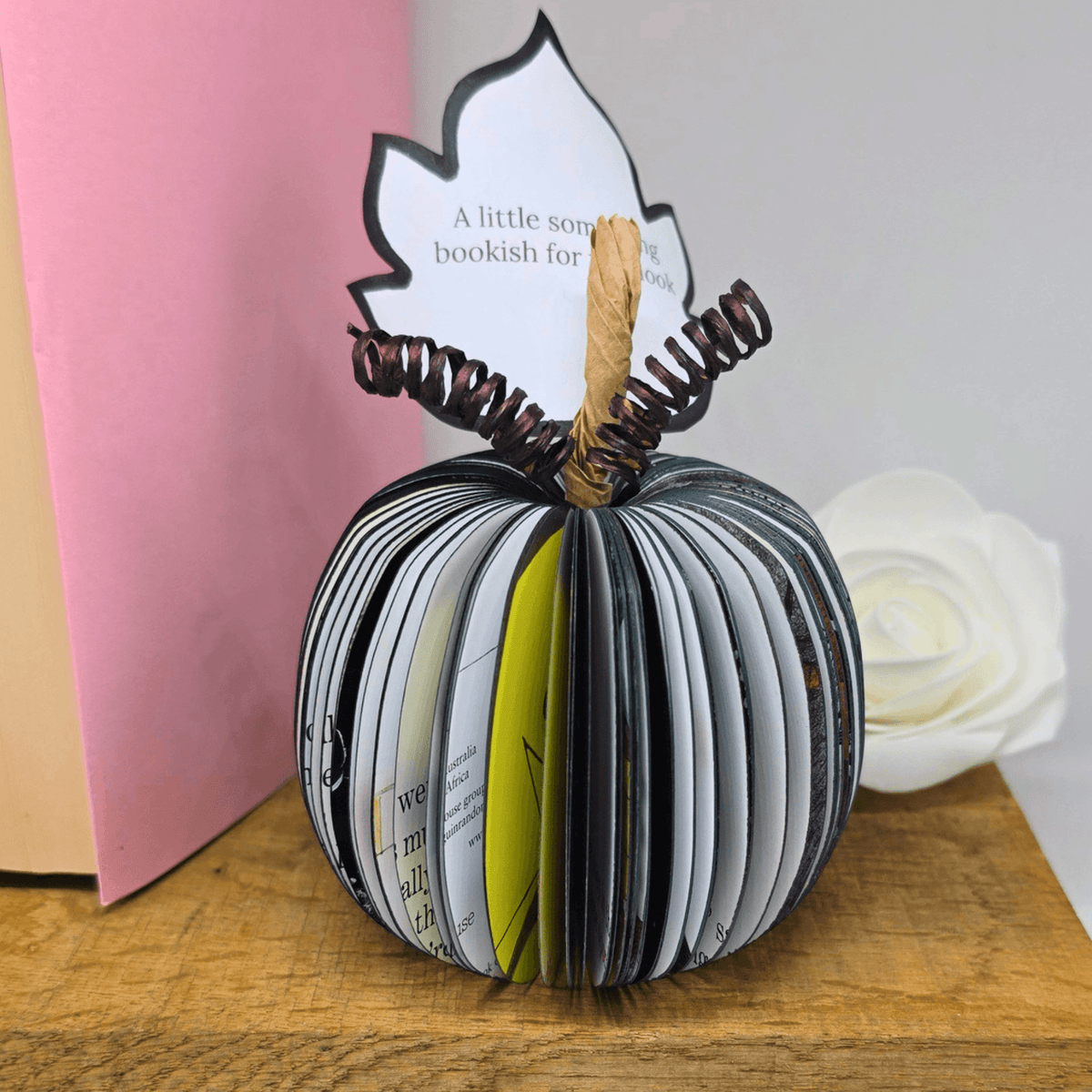 Nightmare Before Christmas black pumpkin book gift, front view showing personalised leaf and hand-cut pages