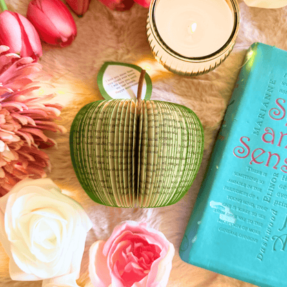 Personalised leaf with custom message on Sense and Sensibility book apple