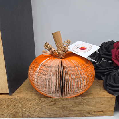 Small handmade book pumpkin Halloween decoration with The Paper Apple Co gift tag