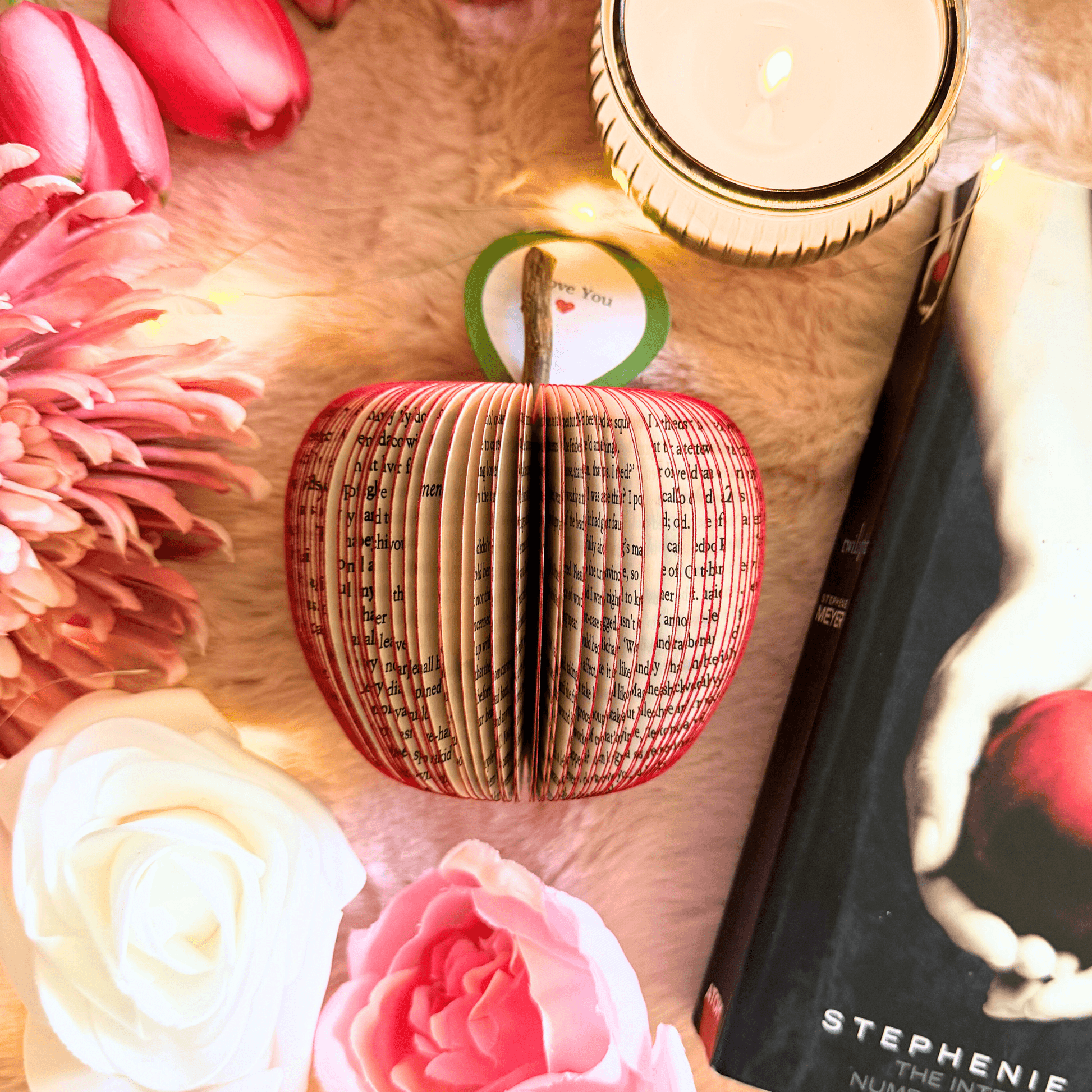 Handmade Twilight Saga book apple with personalised leaf styled with flowers and candle romantic anniversary gift