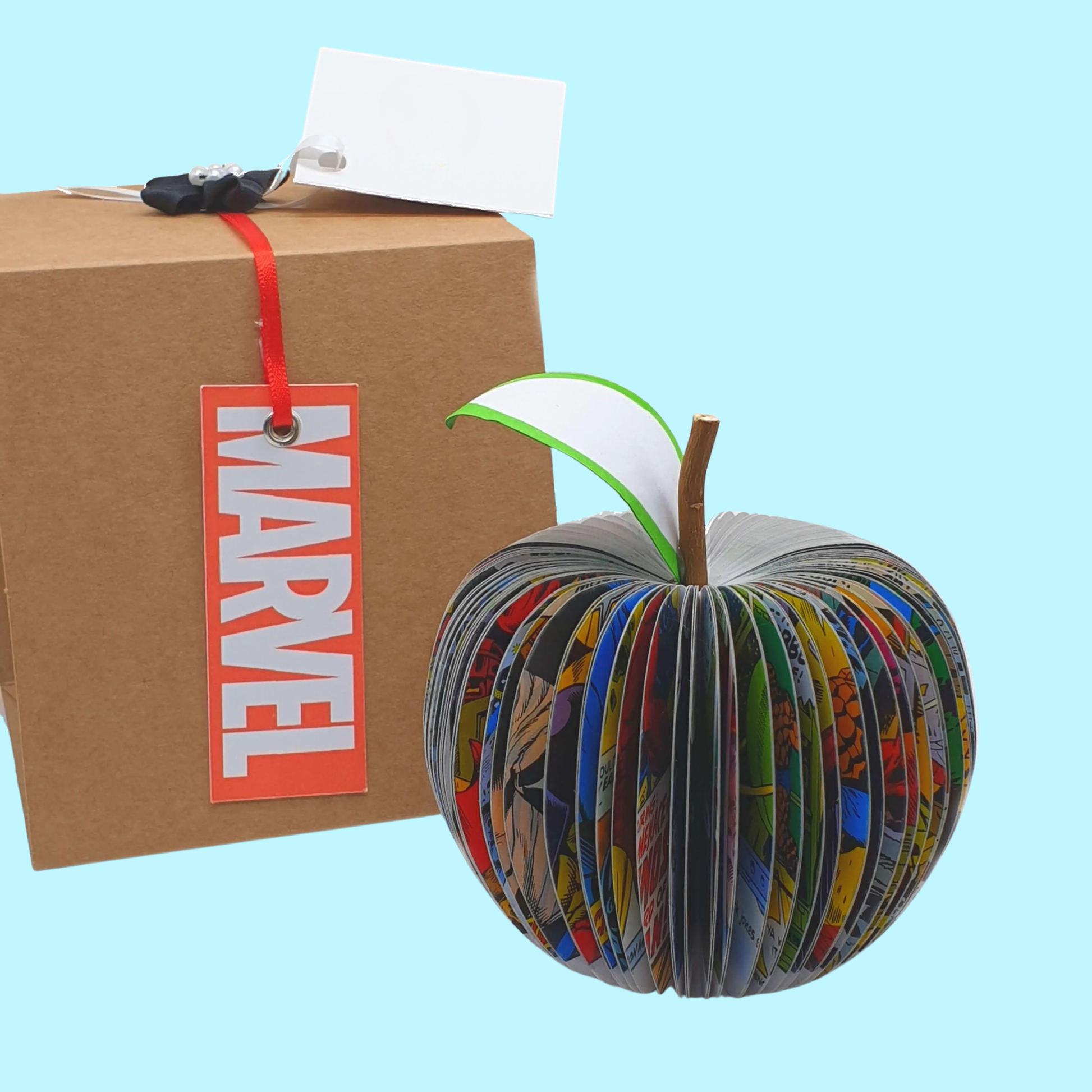 Handmade Wolverine comic book apple gift made from recycled comic pages with Marvel themed packaging