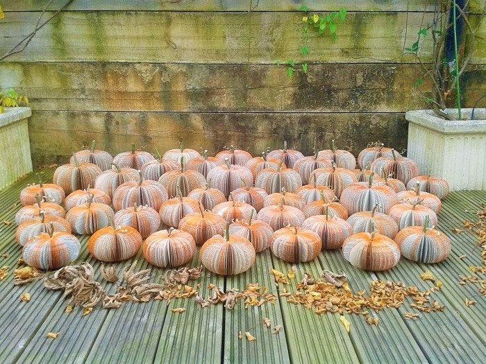 Large book page pumpkin displayed as autumn decoration