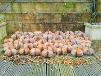 Large book page pumpkin displayed as autumn decoration