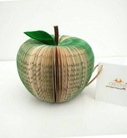 Close-up of Green Apple book apple showing hand-cut book pages detail