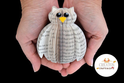 Close-up of Mini Hedwig showing hand-cut book pages