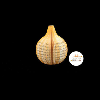 Close-up of Handmade book onion showing hand-cut book pages