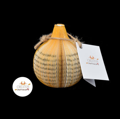 Handmade book onion displayed beside original book
