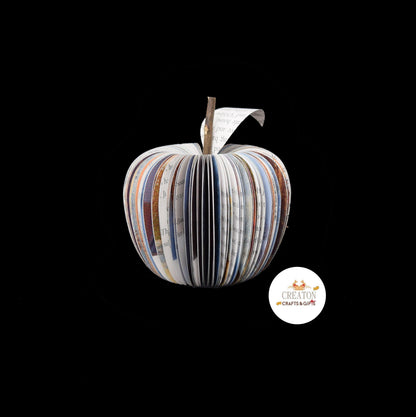 The Lion, the Witch and the Wardrobe book apple held in hands to show size, handmade paper anniversary gift