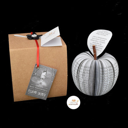 Miss Peregrine's Home for Peculiar Children book apple held in hands to show size, handmade paper anniversary gift