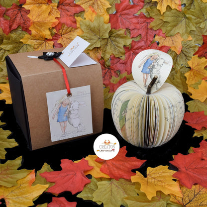 Personalised leaf with custom message on Alice in Wonderland book apple
