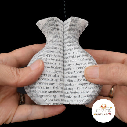 Personalised song lyric vase book gift displayed in a home setting
