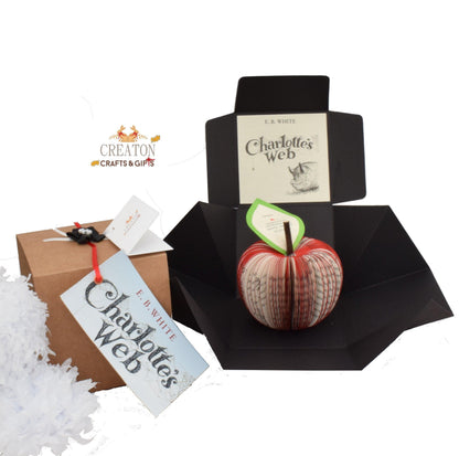 Charlotte's Web book apple held in hands to show size, handmade paper anniversary gift