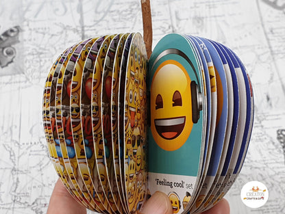 Emoji book apple on neutral background, unique handmade literary gift
