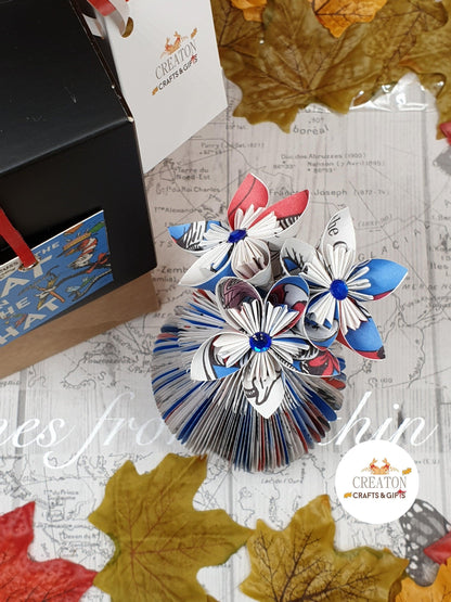 Cat in the Hat Book Vase with Origami Flowers vase held in hands to show size