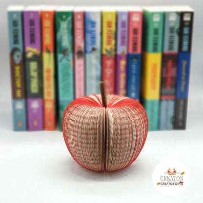 James Bond book apple on neutral background, unique handmade literary gift