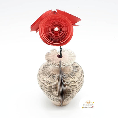 Close-up of Vase and Red Roses vase showing hand-cut book page detail
