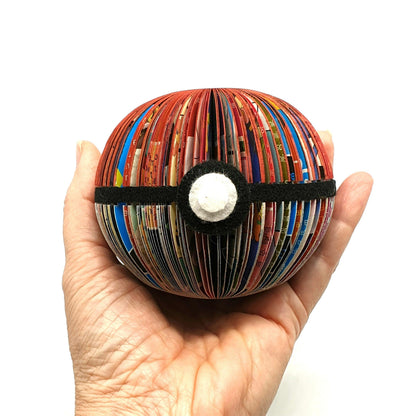 Pokémon book apple displayed beside original book