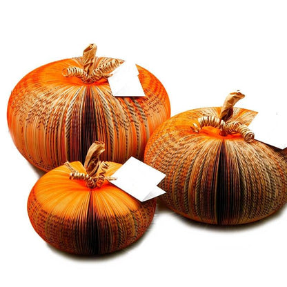 Close-up of Set of 3 handmade book pumpkin showing hand-cut book pages