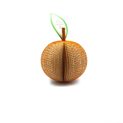 Close-up of Orange gift card showing handmade 3D book page element