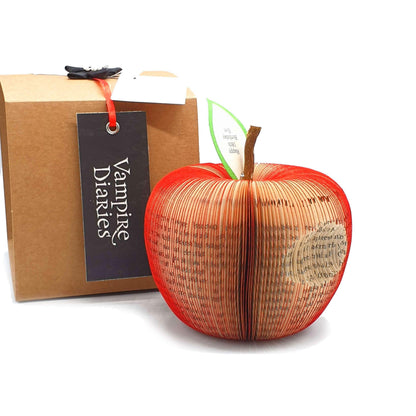 Vampire Diaries book apple held in hands to show size, handmade paper anniversary gift