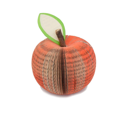 Handmade book peach held in hands to show size