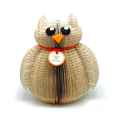 Close-up of Hedwig showing hand-cut book pages