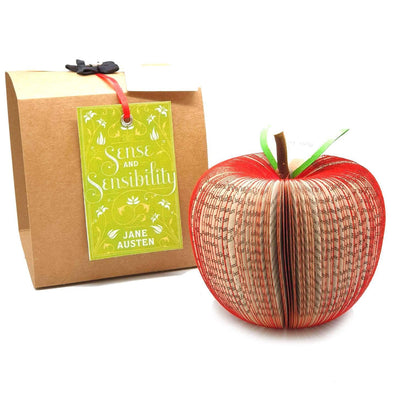 Sense and Sensibility book apple held in hands to show size, handmade paper anniversary gift