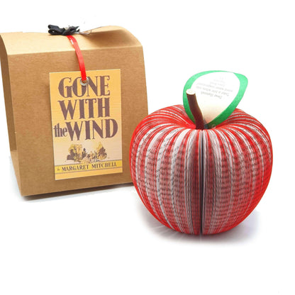 Gone with the Wind book apple held in hands to show size, handmade paper anniversary gift