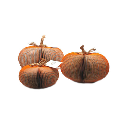 Set of 3 handmade book pumpkin held in hands to show size