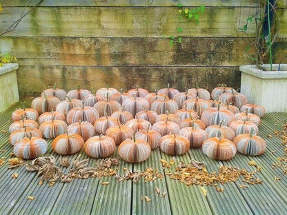 Small handmade book pumpkin displayed as autumn decoration