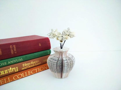 Mini Urn Vase and Flowers vase held in hands to show size