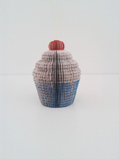 Close-up of Handmade book cupcake showing hand-cut book pages