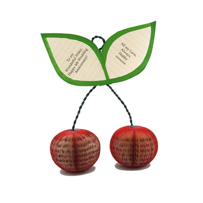 Personalised handmade cherries crafted from reclaimed book pages with printed anniversary message leaves, unique 4th wedding anniversary fruit gift.